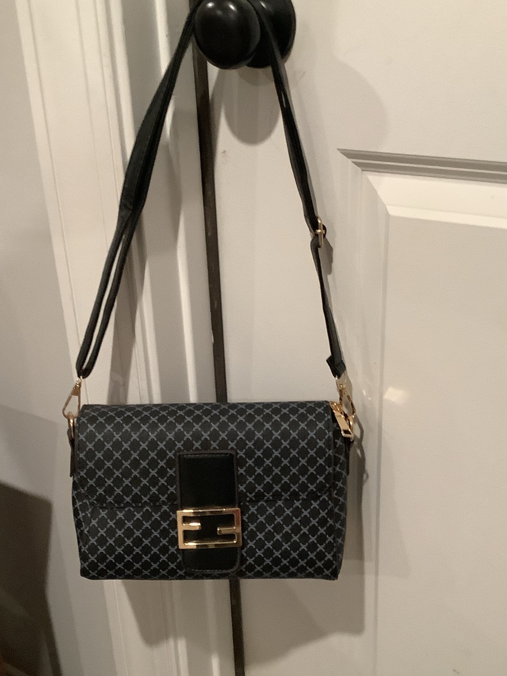 Black Patterned Crossbody Bag with Gold Hardware